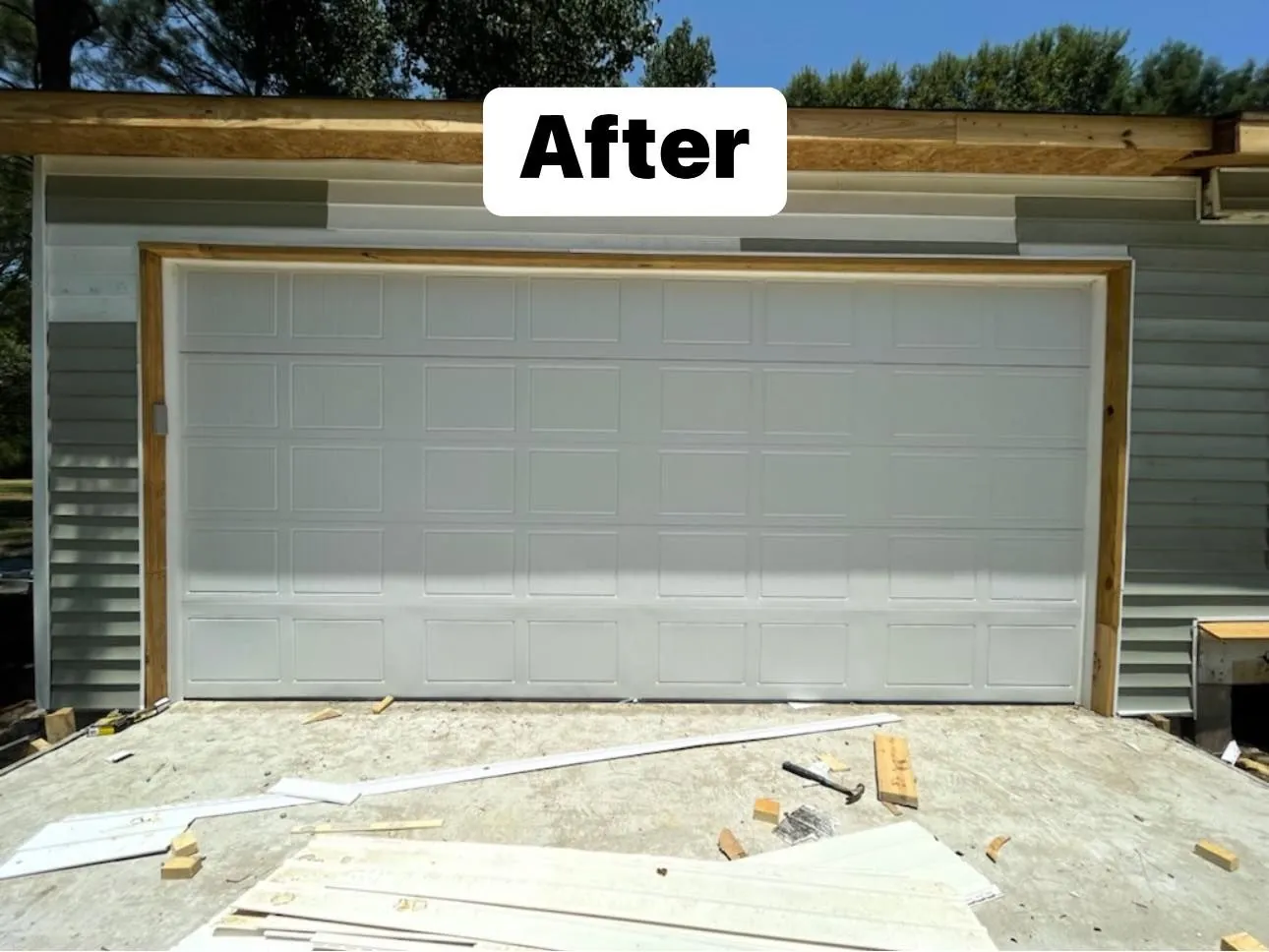 After: Two dated doors replaced with carriage style doors and new hardware
