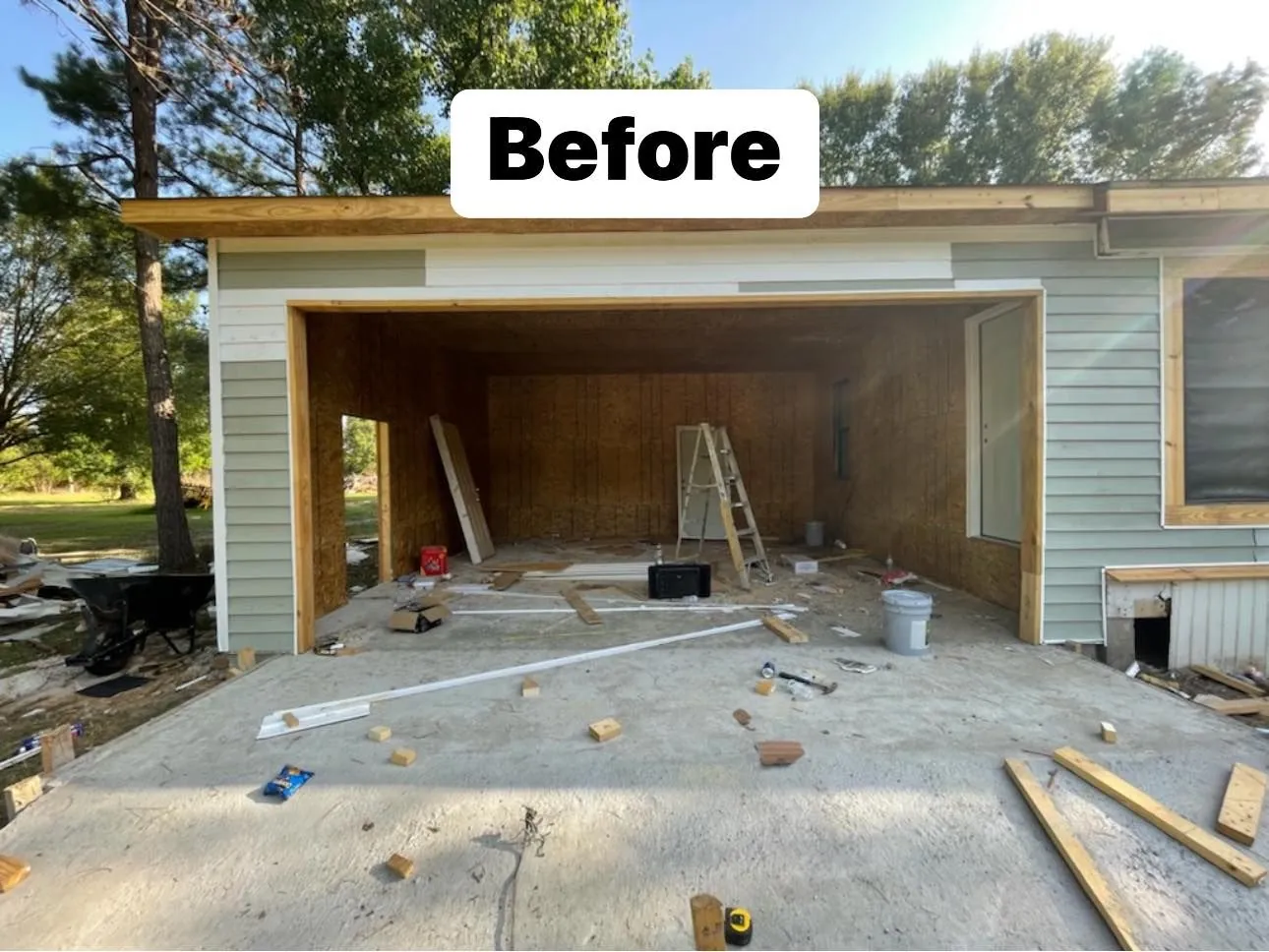 Before: Two dated doors replaced with carriage style doors and new hardware