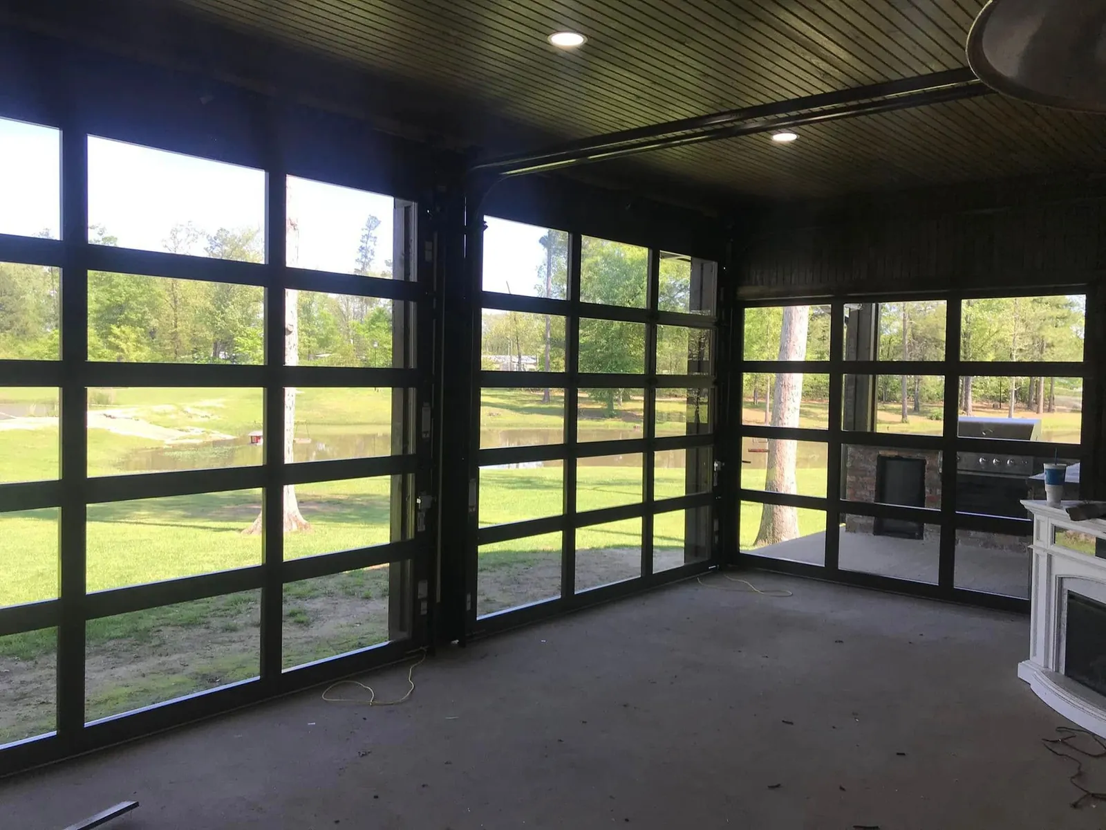 Full view aluminum and glass garage door from inside