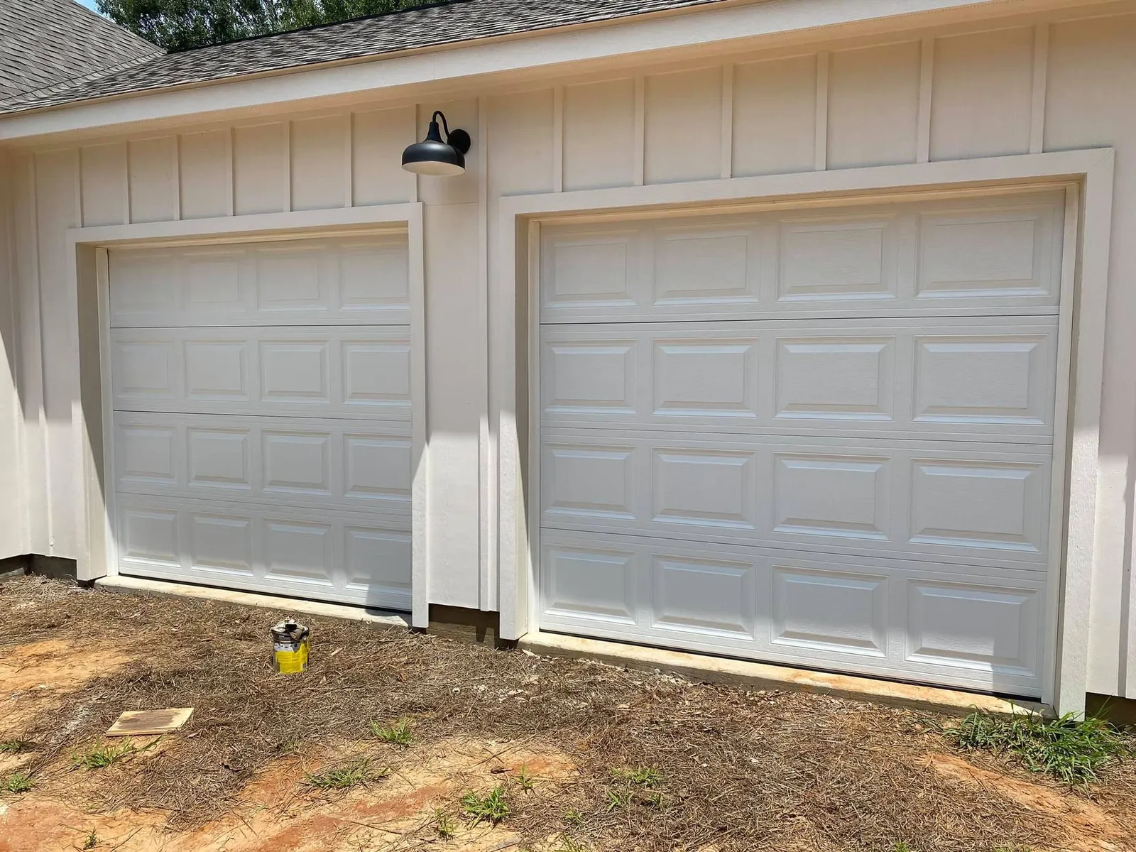 Two white raised panel doors