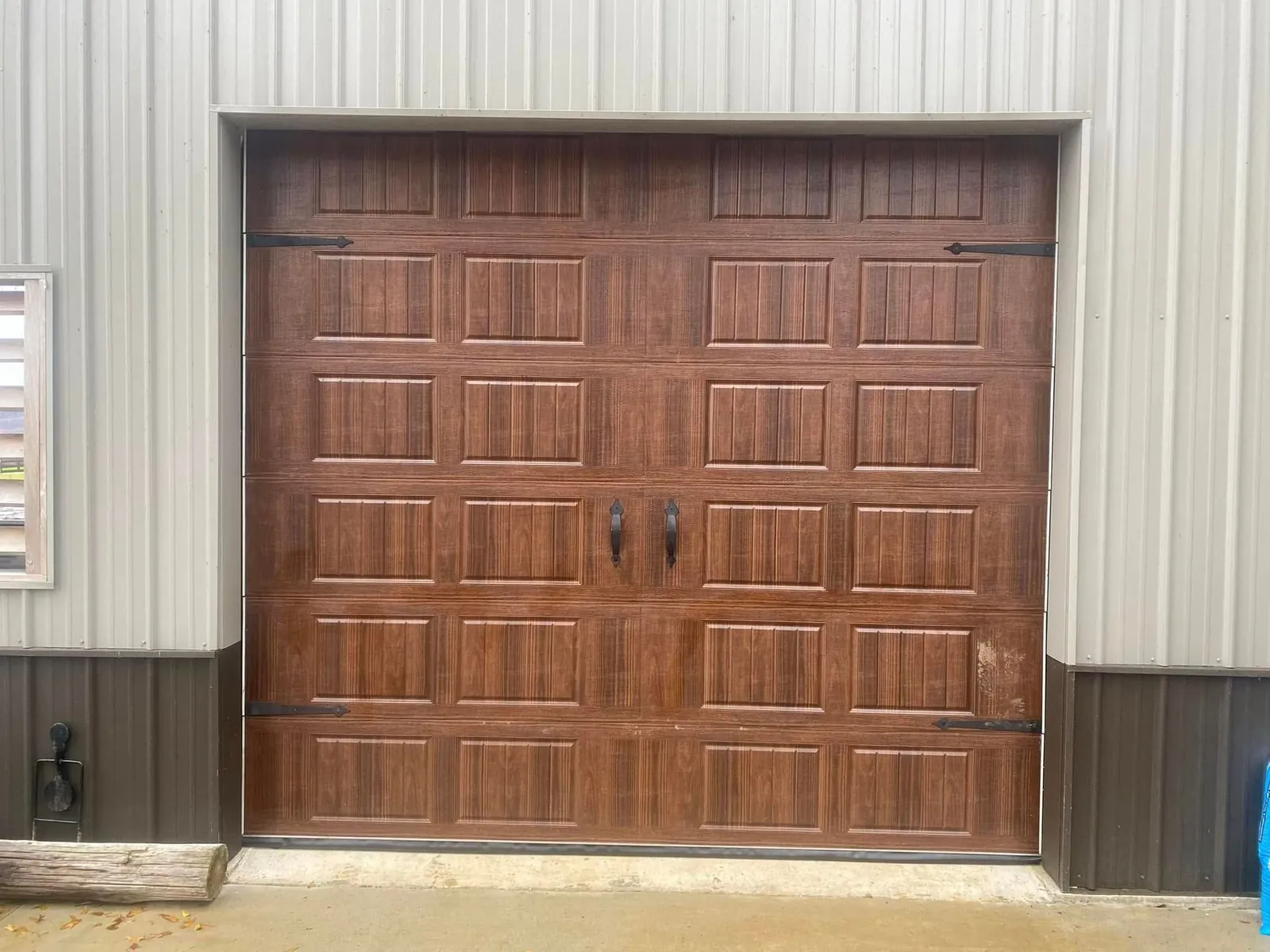 Wood look steel garage door